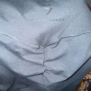 GYMSHARK scrunchie, butt black Activewear leggings
Pockets on both side 
NWOT